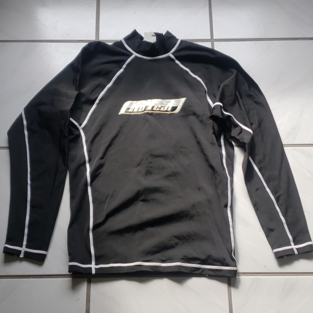 Unique rare "surfer" shirt with "fins" on backside